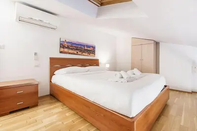 Letto o letti in una camera di view of the Arno Window on the Arno VII wifi, ac