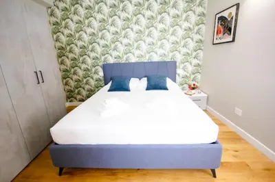 Letto o letti in una camera di Montebello Central Apartment