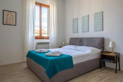 Letto o letti in una camera di Cozy and Bright Flat - Top Floor with Elevator