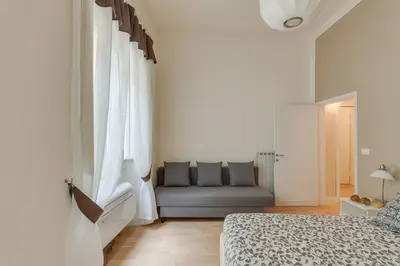 Letto o letti in una camera di San Lorenzo Dome Apartment