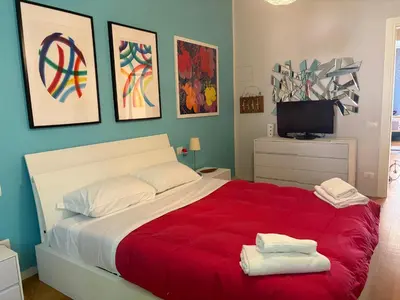 Letto o letti in una camera di Marconi 10 - Vivi Firenze come un fiorentino