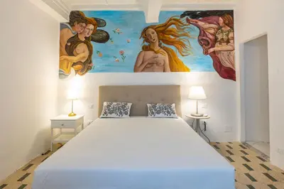Letto o letti in una camera di Pitti Suite 13 residenza d'epoca