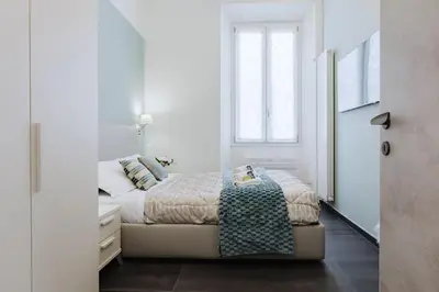 Letto o letti in una camera di Charme Of Santa Maria Novella