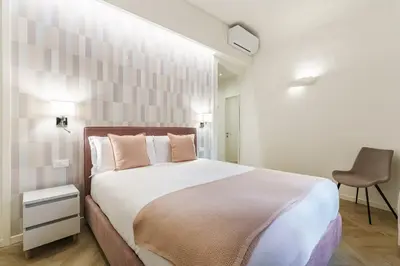 Letto o letti in una camera di Designer Apartment in Oltrarno