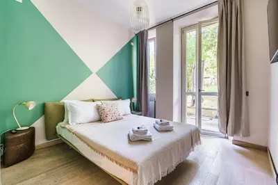 Letto o letti in una camera di Poggio Imperiale Home By San Firenze Collection