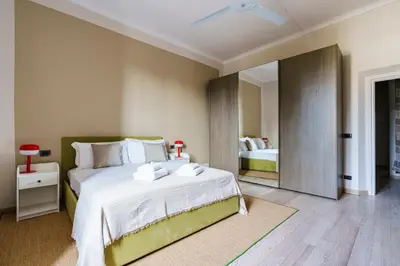 Letto o letti in una camera di Poggio Imperiale Home By San Firenze Collection