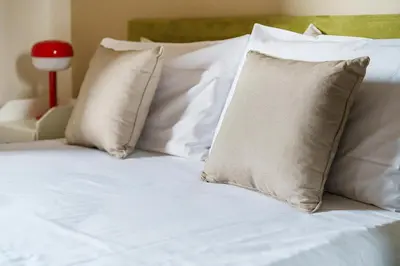 Letto o letti in una camera di Poggio Imperiale Home By San Firenze Collection