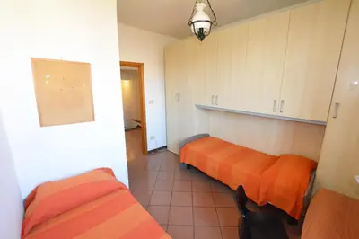 Letto o letti in una camera di UNYCA - Florence Santa Croce 3-bedroom Apartment