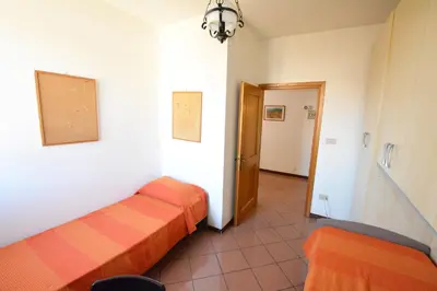 Letto o letti in una camera di UNYCA - Florence Santa Croce 3-bedroom Apartment