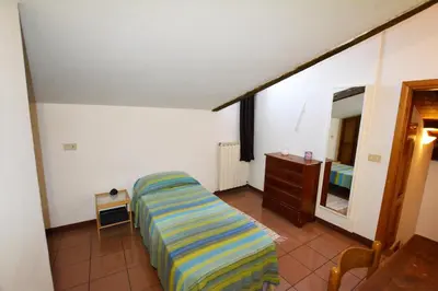 Letto o letti in una camera di UNYCA - Florence Santa Croce 3-bedroom Apartment