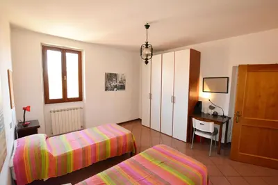 Letto o letti in una camera di UNYCA - Florence Santa Croce 3-bedroom Apartment