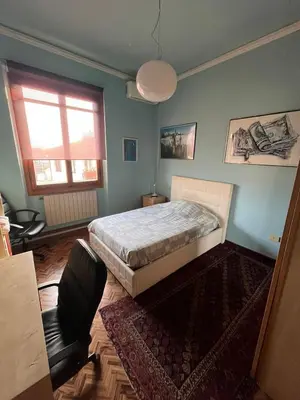 Letto o letti in una camera di SERRA's Home - Bright Apt Statuto Area near Center