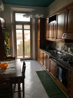 Cucina o angolo cottura di SERRA's Home - Bright Apt Statuto Area near Center