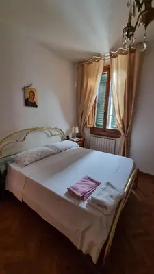 Letto o letti in una camera di Casa ALDA