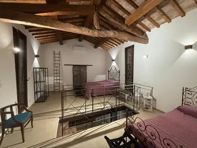 Letto o letti in una camera di Il Fienile di Bisarno