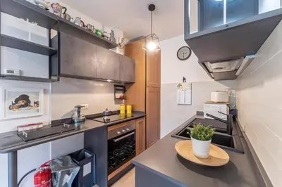 Cucina o angolo cottura di UNYCA - Charming Oltrarno Apartment Florence