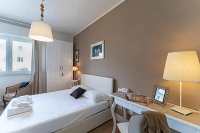 Letto o letti in una camera di UNYCA - Charming Oltrarno Apartment Florence