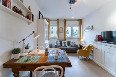 Area soggiorno di UNYCA - Charming Oltrarno Apartment Florence