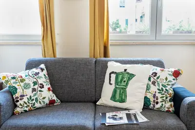 Area soggiorno di UNYCA - Charming Oltrarno Apartment Florence