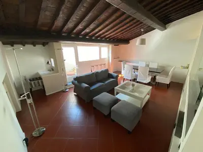 Area soggiorno di Elena's home