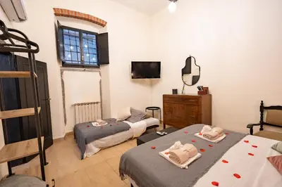 Letto o letti in una camera di Santa Croce 2Suite Apartment