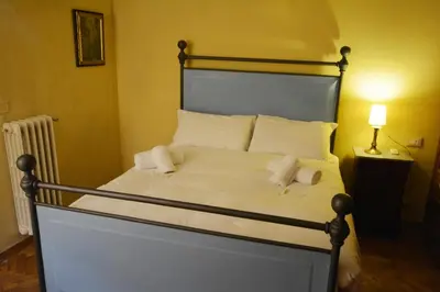 Letto o letti in una camera di UNYCA - Florence Spacious Apartment
