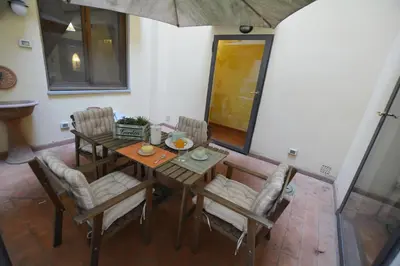 Area soggiorno di UNYCA - Florence Spacious Apartment