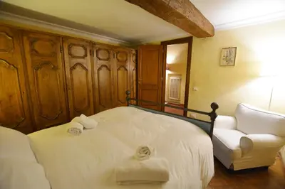 Letto o letti in una camera di UNYCA - Florence Spacious Apartment