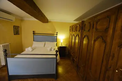 Letto o letti in una camera di UNYCA - Florence Spacious Apartment