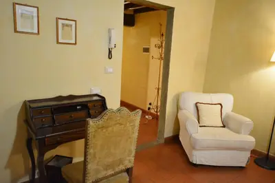 Area soggiorno di UNYCA - Florence Spacious Apartment