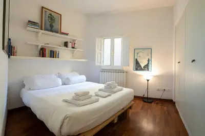 Letto o letti in una camera di San Niccolo' Apartment