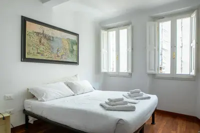 Letto o letti in una camera di San Niccolo' Apartment