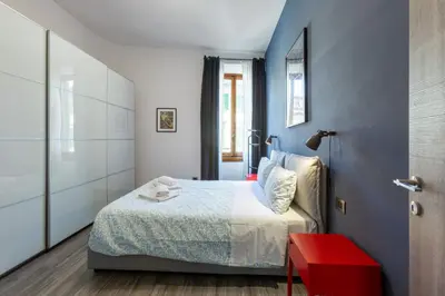 Letto o letti in una camera di GuestHost - Lights, Camera, Action! - Florence Apt