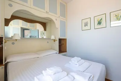 Letto o letti in una camera di Romantic Terrace Apartment