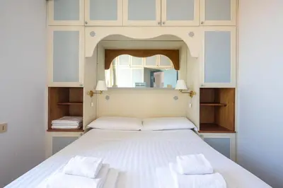 Letto o letti in una camera di Romantic Terrace Apartment