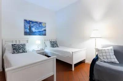 Letto o letti in una camera di Faenza Home