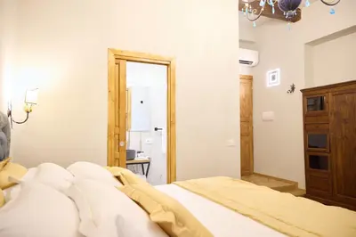 Letto o letti in una camera di Residenza Maglioni in San Pierino