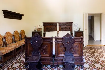 Area soggiorno di Villa dell'Artista - Camere con bagno privato in Villa storica