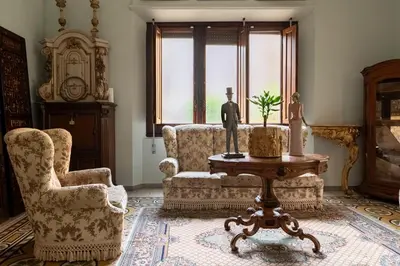 Area soggiorno di Villa dell'Artista - Camere con bagno privato in Villa storica