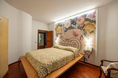 Letto o letti in una camera di Un'oasi di pace vicino al centro storico