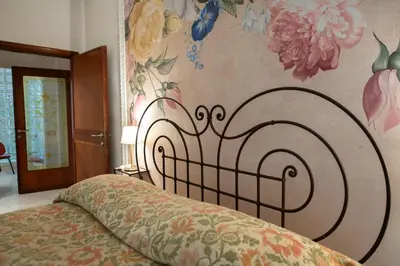 Letto o letti in una camera di Un'oasi di pace vicino al centro storico