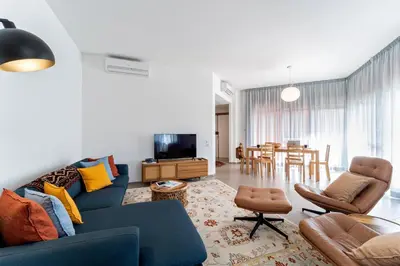 Area soggiorno di UNYCA - Bright Florence Apartment