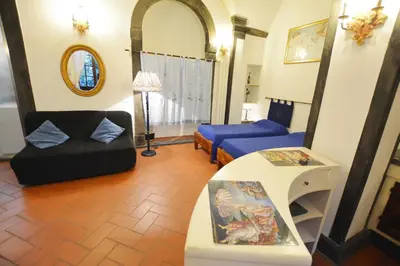 Area soggiorno di UNYCA - Florence Santo Spirito Loft