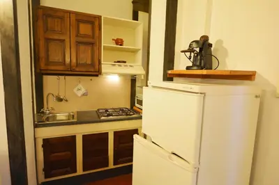 Cucina o angolo cottura di UNYCA - Florence Santo Spirito Loft