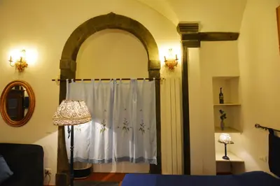 Letto o letti in una camera di UNYCA - Florence Santo Spirito Loft