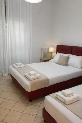 Letto o letti in una camera di Da Giulia