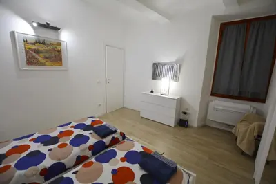 Letto o letti in una camera di UNYCA - Florence Central Apartment
