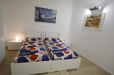 Letto o letti in una camera di UNYCA - Florence Central Apartment