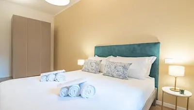 Letto o letti in una camera di Prestigious Apt