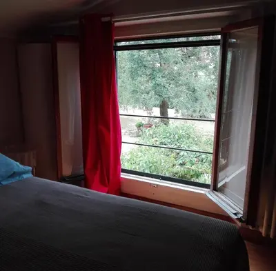 Letto o letti in una camera di Una casina nel verde a Firenze